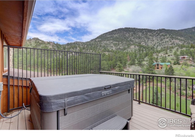 178 Cree Ct, Lyons, CO 80540 - deck with a hot tub and a mountain view