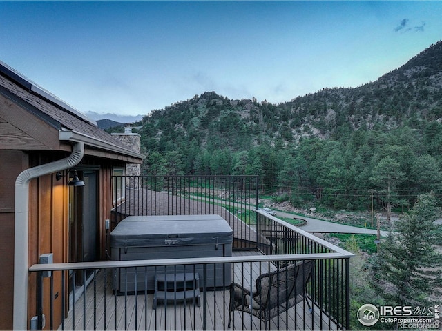 178 Cree Ct, Lyons, CO 80540 - wooden deck with a mountain view and a wooded view