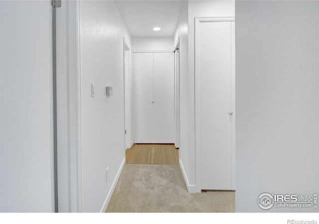 3275 34th St Unit 76, Boulder, CO 80301 - hallway featuring carpet, baseboards, and recessed lighting