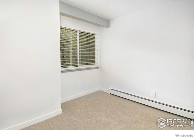 3275 34th St Unit 76, Boulder, CO 80301 - spare room featuring a baseboard heating unit, carpet flooring, and baseboards