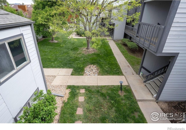 3275 34th St Unit 76, Boulder, CO 80301 - view of green lawn with a balcony
