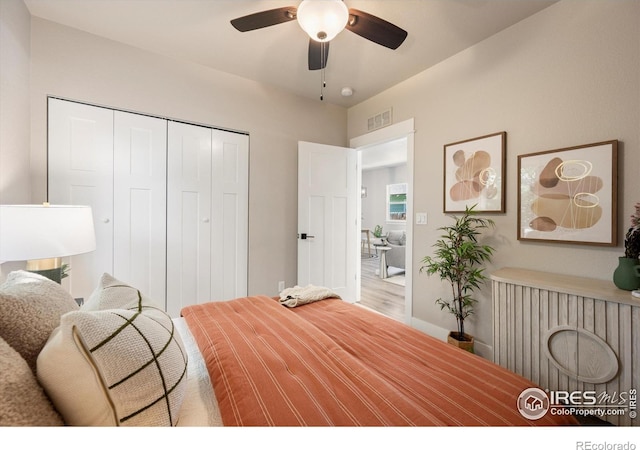 217 Locust St, Windsor, CO 80550 - bedroom with a closet, a ceiling fan, and wood finished floors