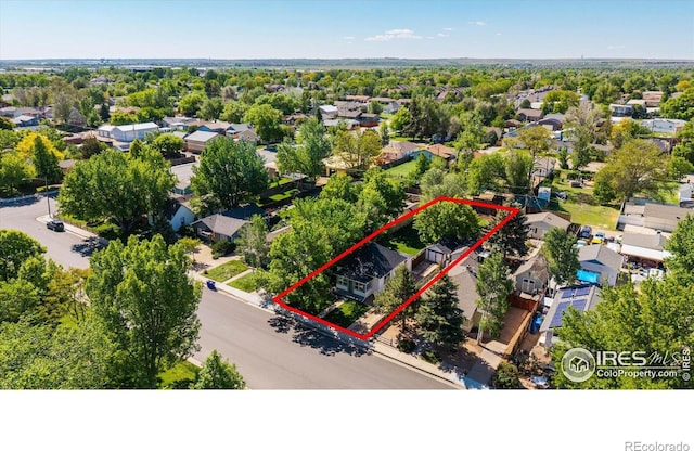 217 Locust St, Windsor, CO 80550 - aerial view of residential area with property parcel outlined
