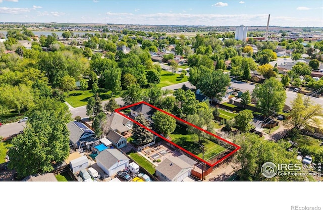 217 Locust St, Windsor, CO 80550 - aerial perspective of suburban area with property boundaries highlighted
