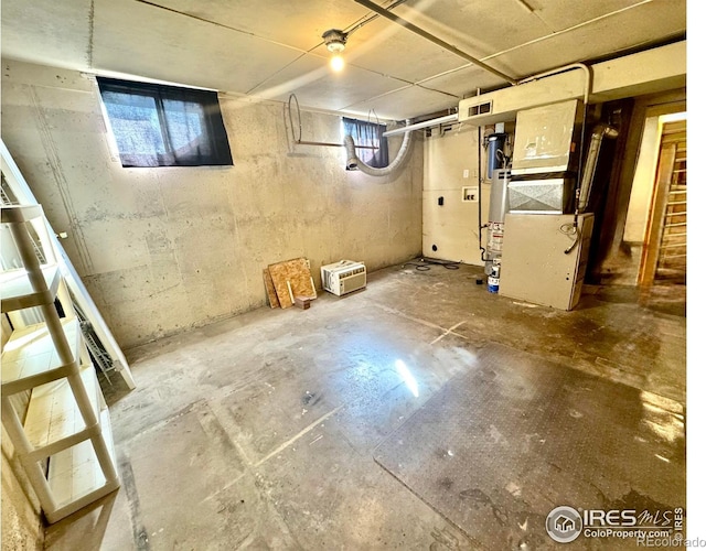 2614 Willard Dr, Colorado Springs, CO 80911 - below grade area with plenty of natural light, gas water heater, and heating unit