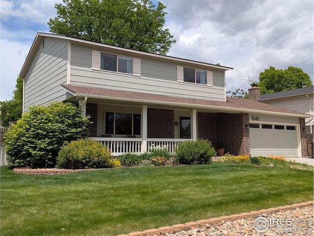 1545 S Vivian St, Longmont, CO 80501 - traditional-style house with a porch, brick siding, and a garage