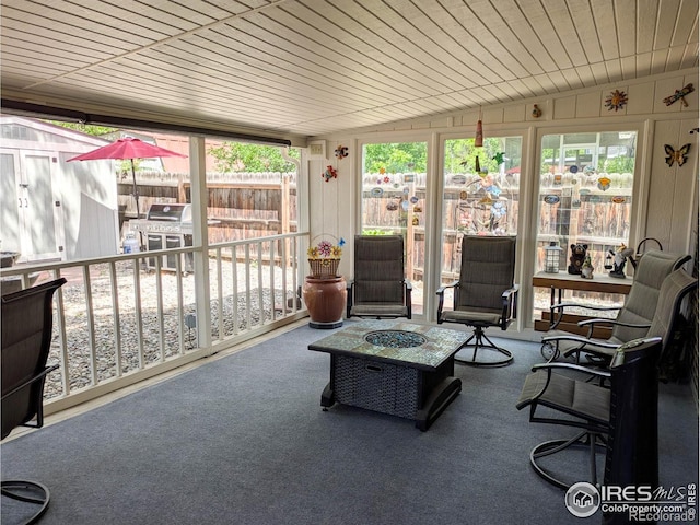 1545 S Vivian St, Longmont, CO 80501 - sunroom / solarium with an outdoor fire pit