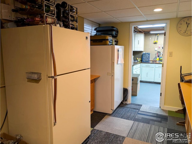 1545 S Vivian St, Longmont, CO 80501 - kitchen featuring freestanding refrigerator, a paneled ceiling, and recessed lighting