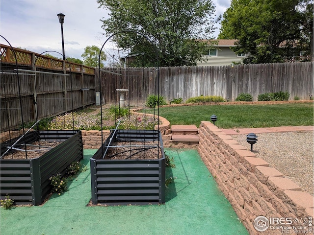 1545 S Vivian St, Longmont, CO 80501 - view of yard with a vegetable garden