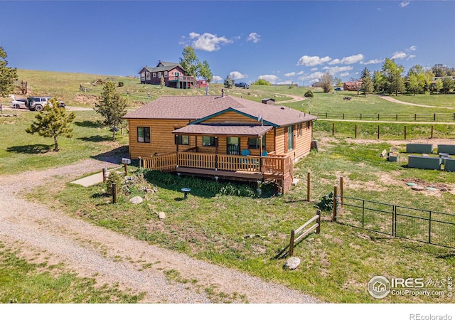 519 Palisade Mountain Dr, Drake, CO 80515 - view of front facade with a deck, a view of countryside, and faux log siding