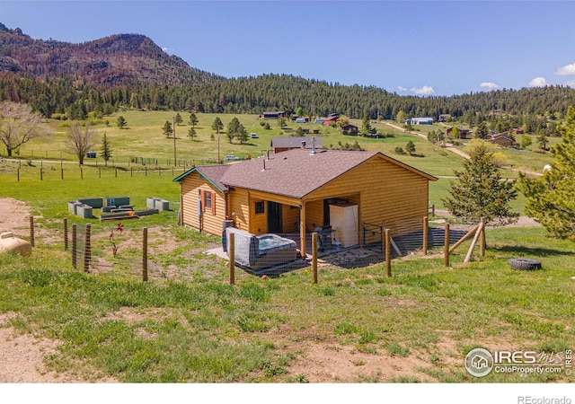 519 Palisade Mountain Dr, Drake, CO 80515 - rear view of property featuring a wooded view, a mountain view, and a shingled roof