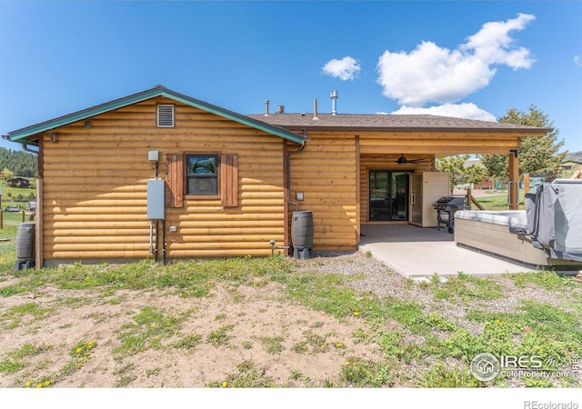 519 Palisade Mountain Dr, Drake, CO 80515 - back of property with a patio and log veneer siding
