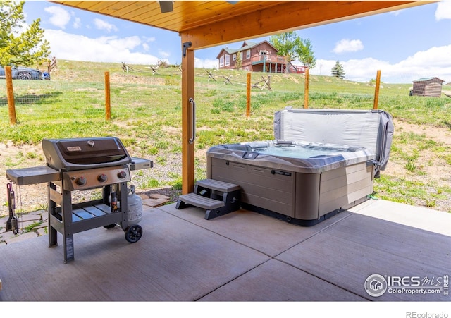 519 Palisade Mountain Dr, Drake, CO 80515 - view of patio featuring a hot tub and area for grilling