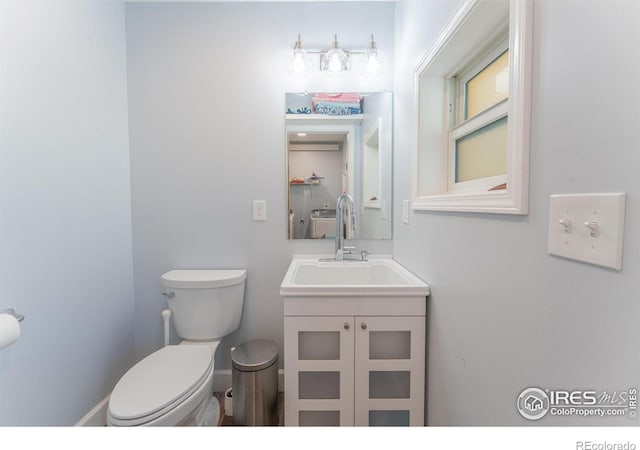519 Palisade Mountain Dr, Drake, CO 80515 - half bathroom with vanity and toilet