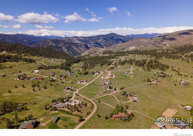 519 Palisade Mountain Dr, Drake, CO 80515 - aerial overview of property's location with a mountain backdrop and rural landscape