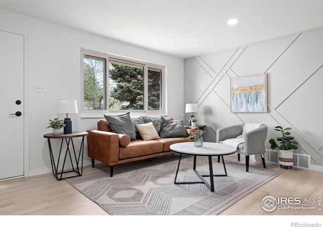 5329 Flower Cir, Arvada, CO 80002 - living room featuring light wood finished floors, recessed lighting, and baseboards