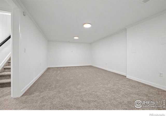 5329 Flower Cir, Arvada, CO 80002 - finished below grade area with carpet, ornamental molding, stairs, and baseboards