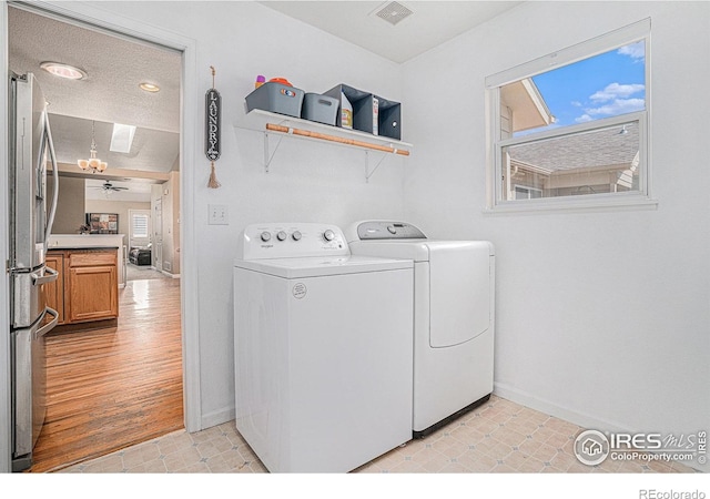 3525 Auntie Stone St Unit 7, Fort Collins, CO 80526 - laundry area featuring washer and dryer and baseboards