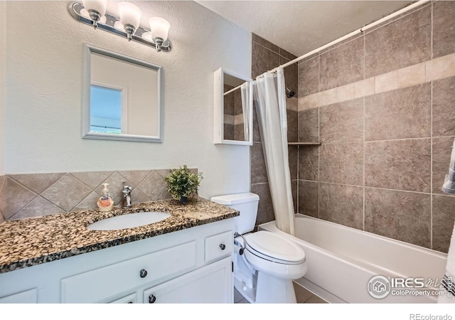 2977 Eagle Way, Boulder, CO 80301 - full bath with vanity, shower / bathtub combination with curtain, toilet, and tasteful backsplash
