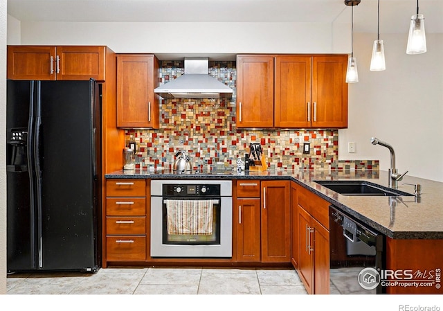 4489 Wellington Rd, Boulder, CO 80301 - kitchen with black appliances, wall chimney range hood, a sink, a peninsula, and brown cabinetry