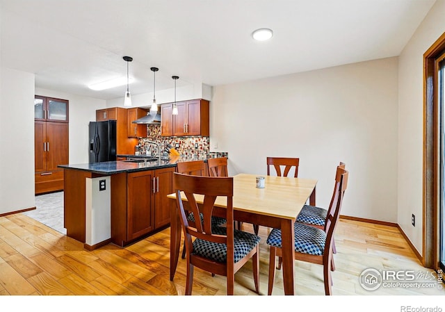 4489 Wellington Rd, Boulder, CO 80301 - dining space featuring light wood finished floors and baseboards