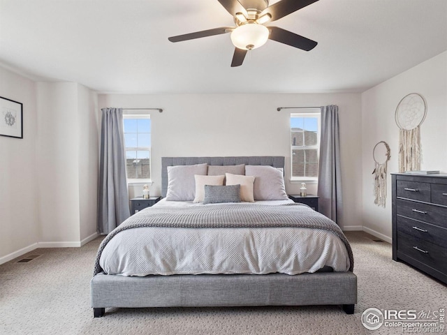 610 Sun Up Pl, Erie, CO 80516 - bedroom featuring multiple windows, carpet flooring, baseboards, and ceiling fan