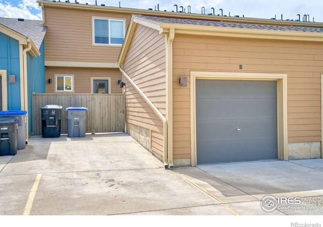 1240 Wren Ct Unit B, Longmont, CO 80501 - garage featuring driveway