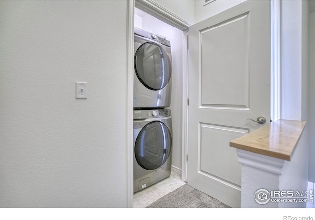 1240 Wren Ct Unit B, Longmont, CO 80501 - laundry room with stacked washer and clothes dryer
