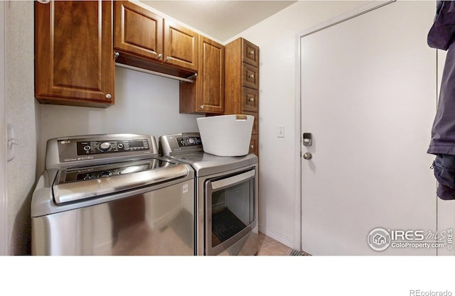 2139 Andrews St, Fort Collins, CO 80528 - laundry room featuring washing machine and clothes dryer and cabinet space