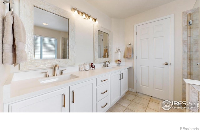 2139 Andrews St, Fort Collins, CO 80528 - bathroom with double vanity, tile patterned flooring, and tiled shower