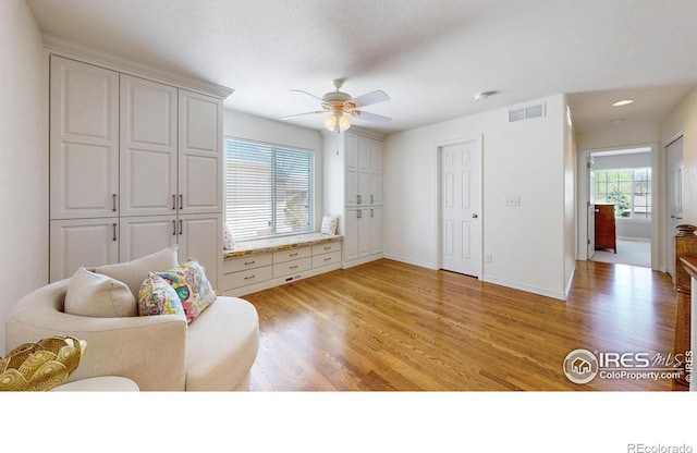 2139 Andrews St, Fort Collins, CO 80528 - sitting room with light wood-type flooring, ceiling fan, and baseboards