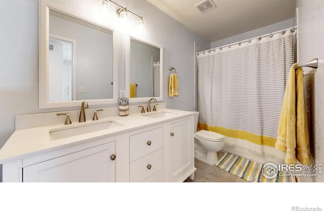 2139 Andrews St, Fort Collins, CO 80528 - full bath with toilet, double vanity, and curtained shower