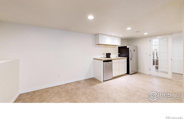 2139 Andrews St, Fort Collins, CO 80528 - kitchen featuring stainless steel appliances, white cabinetry, recessed lighting, and baseboards