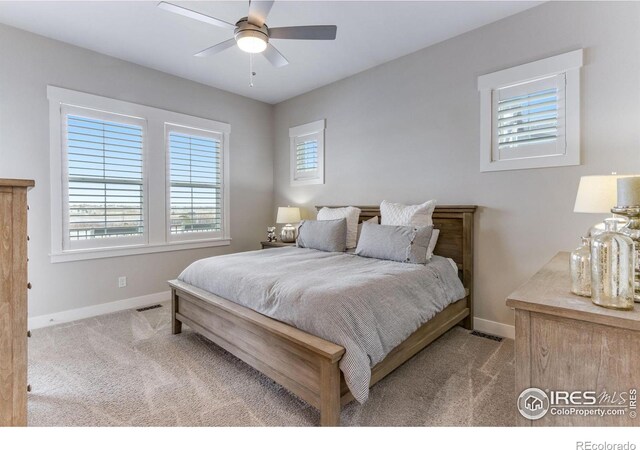 4268 Ardglass Ln, Timnath, CO 80547 - carpeted bedroom featuring baseboards and ceiling fan