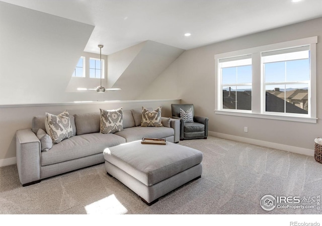 4268 Ardglass Ln, Timnath, CO 80547 - living area with carpet, baseboards, recessed lighting, vaulted ceiling, and a ceiling fan