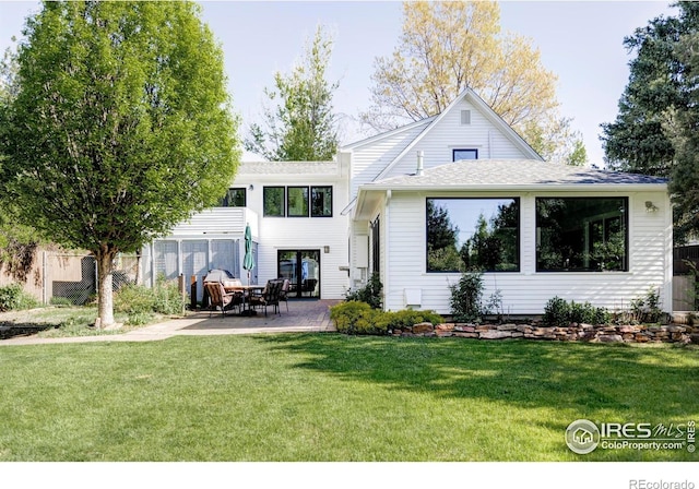 920 Hawthorn Ave, Boulder, CO 80304 - rear view of house with a patio and a yard