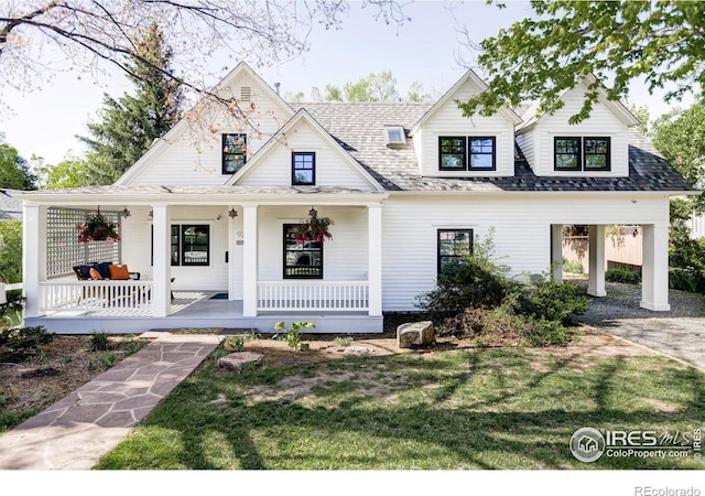 920 Hawthorn Ave, Boulder, CO 80304 - modern farmhouse style home with covered porch and a front yard