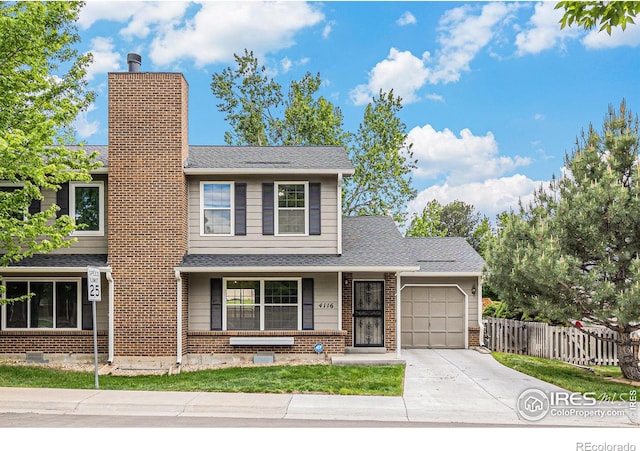 4116 W 111th Cir, Westminster, CO 80031 - traditional-style home with an attached garage, a chimney, concrete driveway, brick siding, and roof with shingles