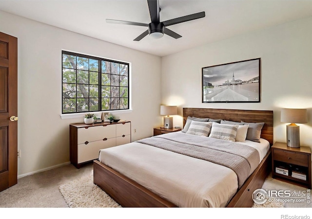 4116 W 111th Cir, Westminster, CO 80031 - bedroom with light colored carpet, a ceiling fan, and baseboards