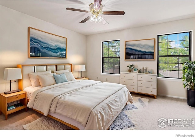 4116 W 111th Cir, Westminster, CO 80031 - bedroom with light colored carpet, baseboards, and a ceiling fan