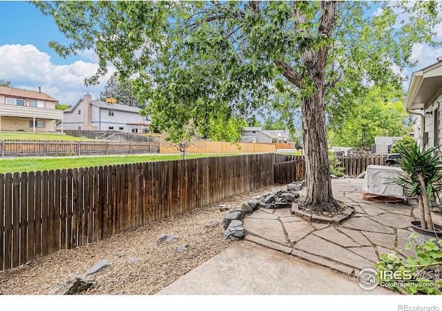 4116 W 111th Cir, Westminster, CO 80031 - fenced backyard with a patio area