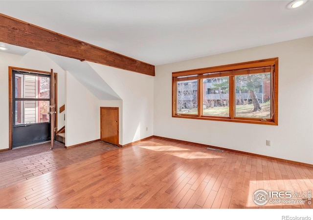 4570 Macarthur Dr, Boulder, CO 80303 - unfurnished living room with baseboards, light wood-type flooring, recessed lighting, and stairs