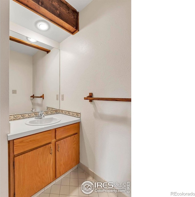 4570 Macarthur Dr, Boulder, CO 80303 - bathroom with vanity and tile patterned floors