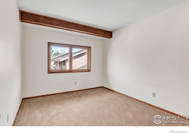 4570 Macarthur Dr, Boulder, CO 80303 - unfurnished room with carpet floors, baseboards, and beamed ceiling