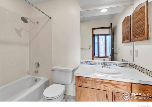 4570 Macarthur Dr, Boulder, CO 80303 - bathroom featuring toilet, vanity, shower / bathtub combination, and tile patterned floors