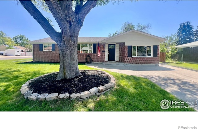 8290 Chase Way, Arvada, CO 80003 - single story home with brick siding