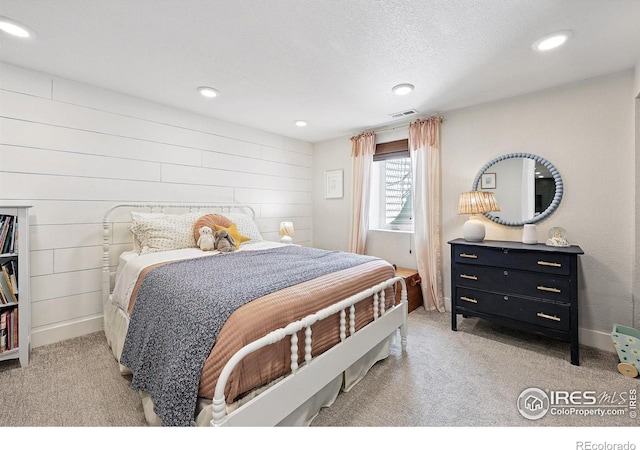 8290 Chase Way, Arvada, CO 80003 - bedroom with light carpet and recessed lighting