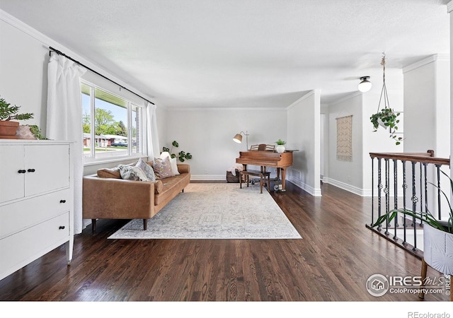 8290 Chase Way, Arvada, CO 80003 - living room with ornamental molding, wood finished floors, and baseboards