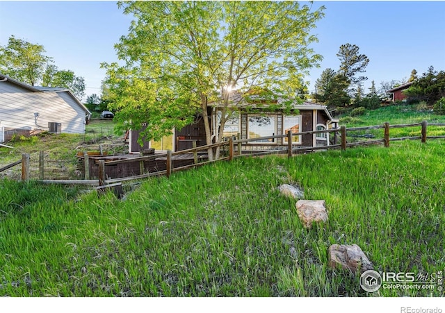 4402 Kano Dr, Fort Collins, CO 80526 - view of yard featuring central AC