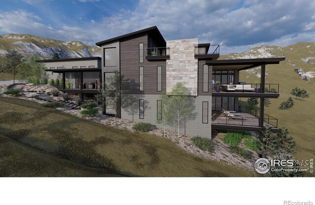 4402 Kano Dr, Fort Collins, CO 80526 - view of side of home featuring a balcony and a mountain view